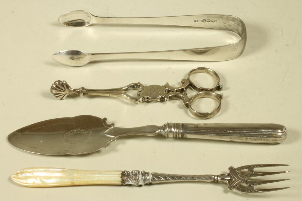 A SMALL COLLECTION OF GEORGIAN AND VICTORIAN SILVER FLATWARE comprising a pair of Victorian sugar Image