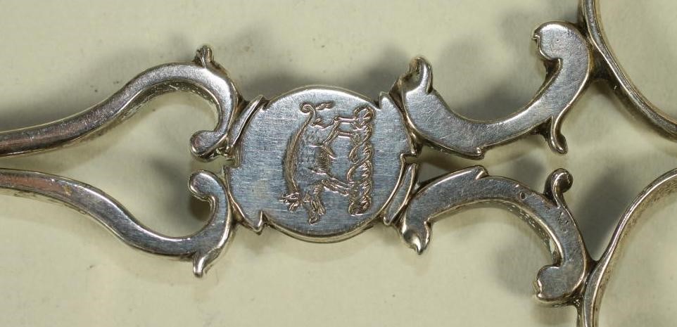 A SMALL COLLECTION OF GEORGIAN AND VICTORIAN SILVER FLATWARE comprising a pair of Victorian sugar Image