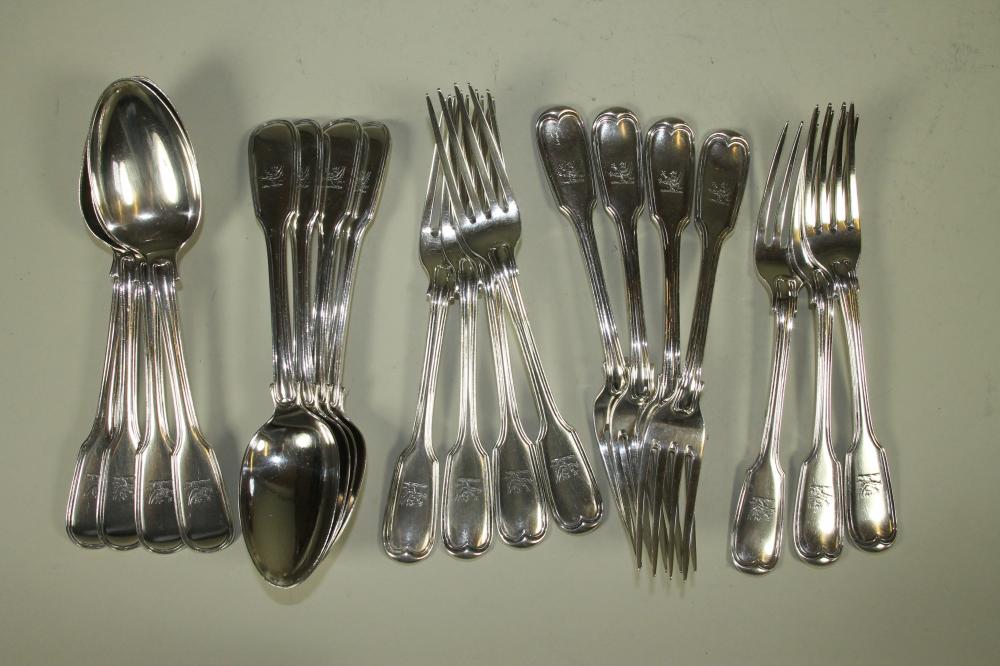 A SET OF ELEVEN WILLIAM IV SILVER DESSERT FORKS Image
