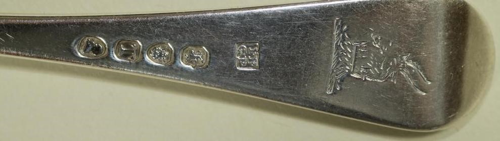 A SET OF THREE LATE GEORGE III SILVER TABLESPOONS Image