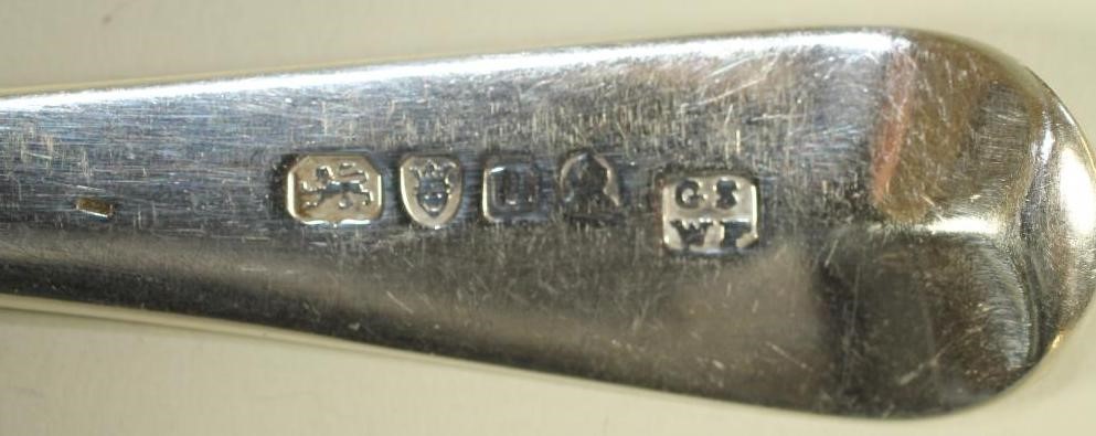 A SET OF THREE LATE GEORGE III SILVER TABLESPOONS Image