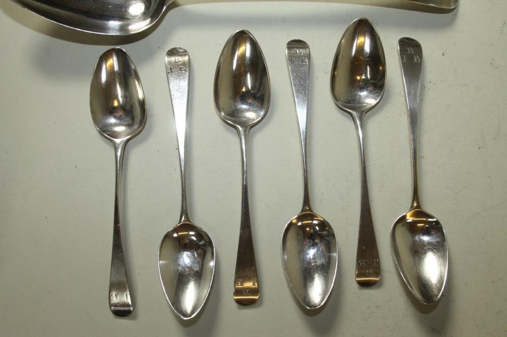 A LATE GEORGE III SILVER TABLESPOON Image