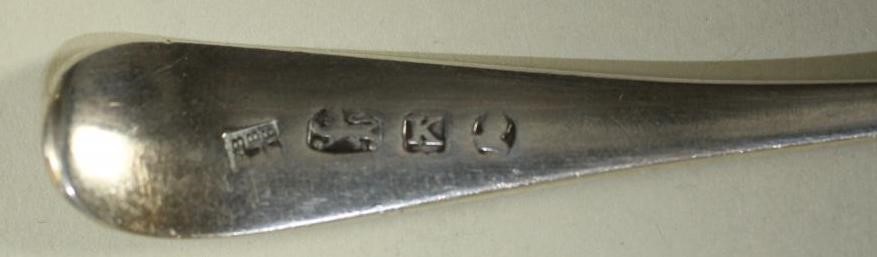 A LATE GEORGE III SILVER TABLESPOON Image