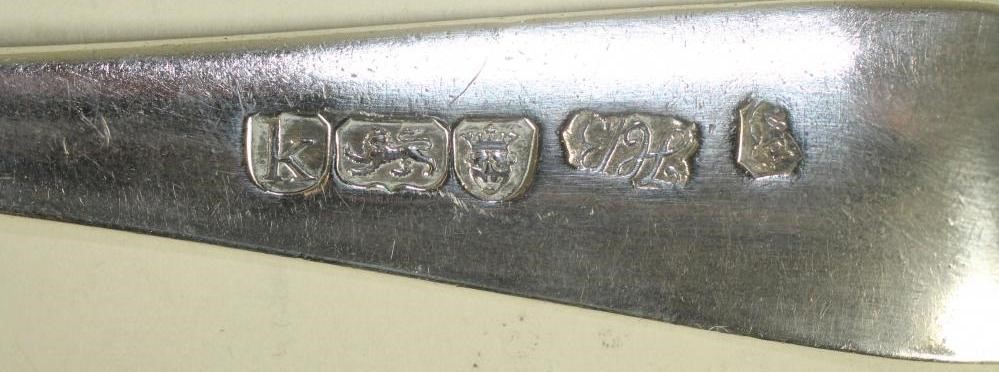 A LATE GEORGE III SILVER TABLESPOON Image