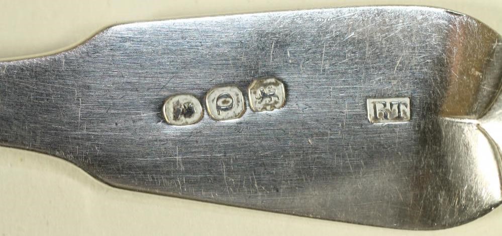 A LATE GEORGE III SILVER TABLESPOON Image