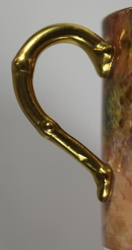 A ROYAL WORCESTER CHINA COFFEE CAN AND SAUCER Image