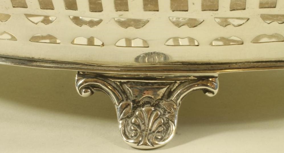 AN EDWARDIAN SILVER BASKET Image
