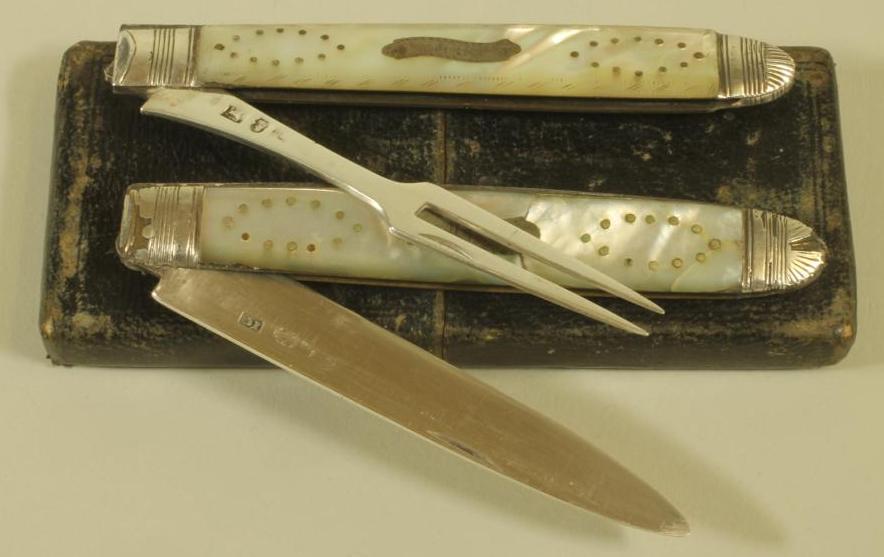 A LATE GEORGE III SILVER FOLDING FRUIT KNIFE AND FORK Image