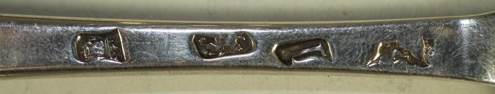 A PAIR OF LATE GEORGE I SILVER TABLESPOONS Image
