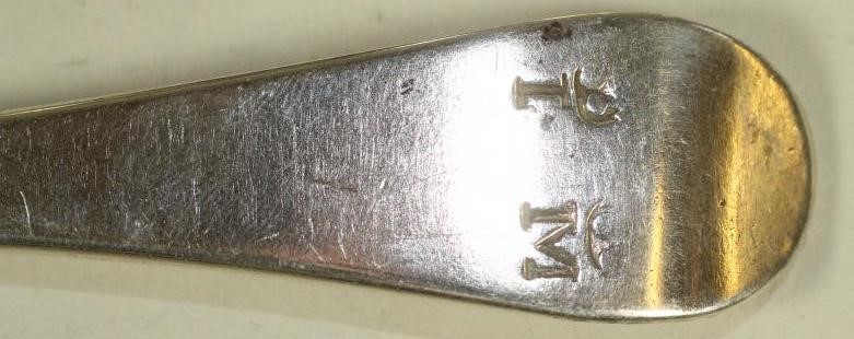 A PAIR OF LATE GEORGE I SILVER TABLESPOONS Image