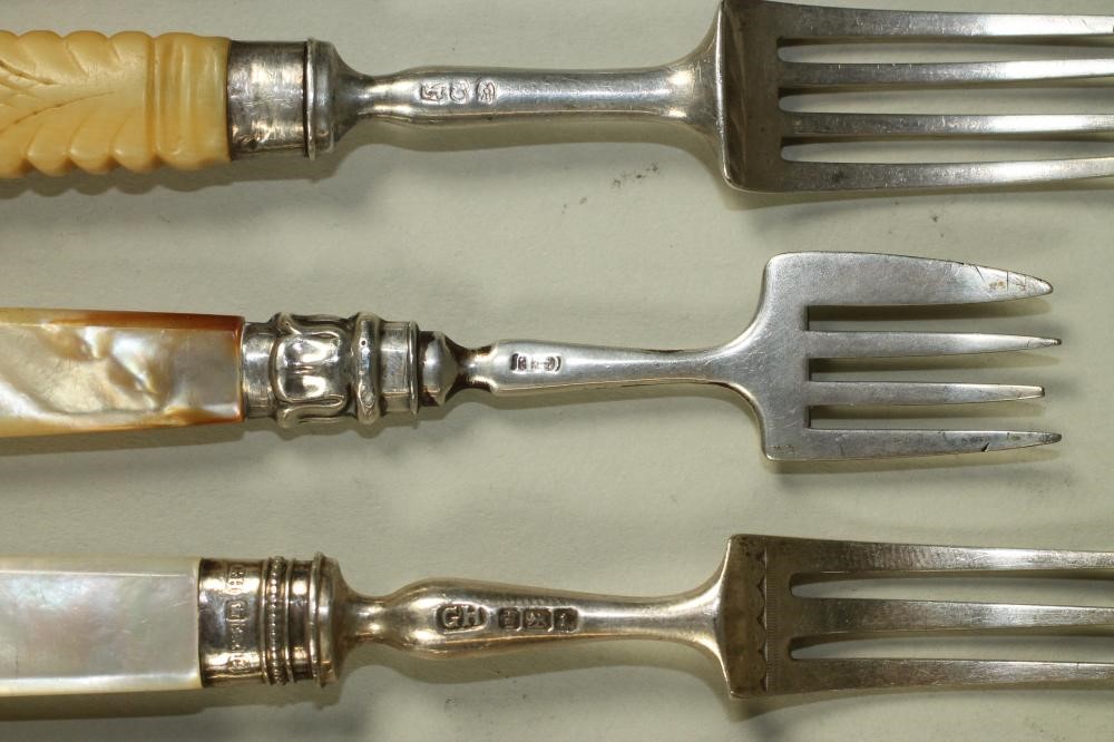 A CHILD'S LATE GEORGE III SILVER KNIFE AND FORK Image