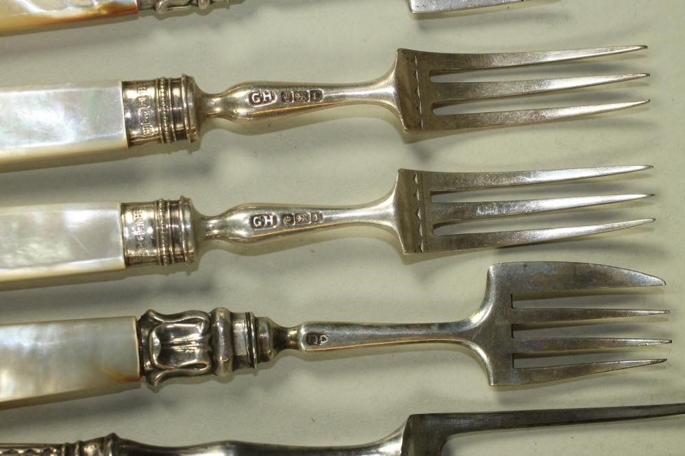 A CHILD'S LATE GEORGE III SILVER KNIFE AND FORK Image