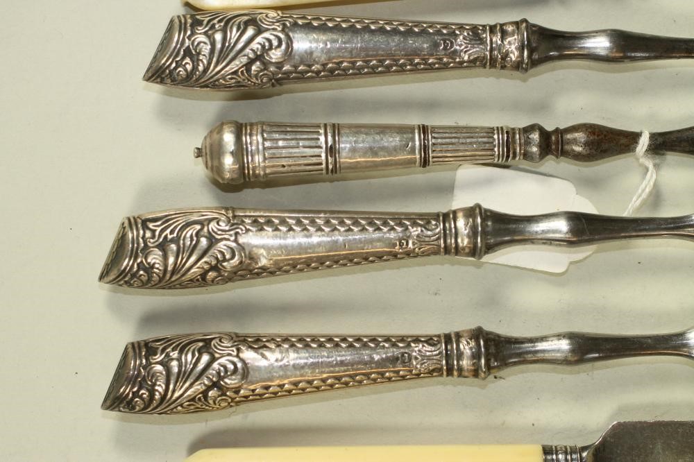 A CHILD'S LATE GEORGE III SILVER KNIFE AND FORK Image