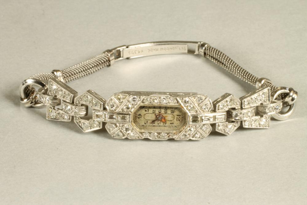AN ART DECO DIAMOND SET PLATINUM COCKTAIL WATCH Image