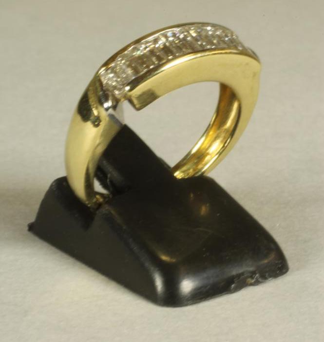 A DIAMOND HALF HOOP ETERNITY RING Image