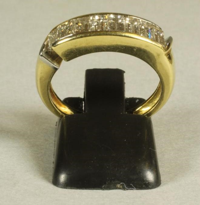 A DIAMOND HALF HOOP ETERNITY RING Image