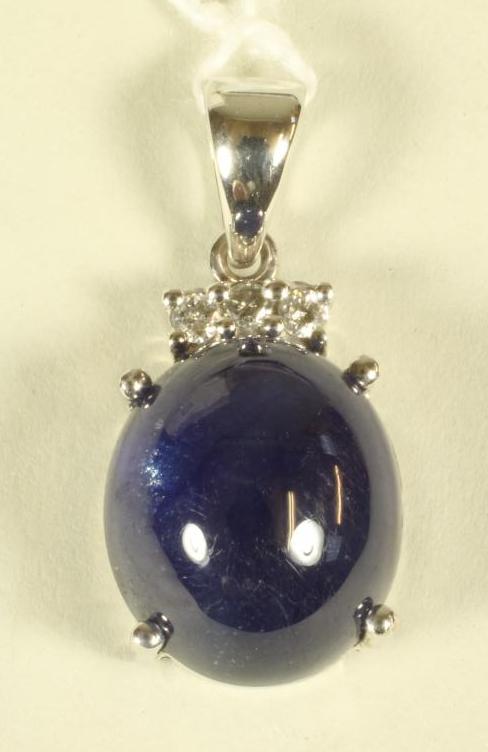 A SAPPHIRE AND DIAMOND PENDANT Image