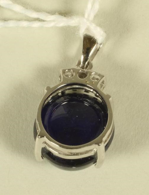 A SAPPHIRE AND DIAMOND PENDANT Image