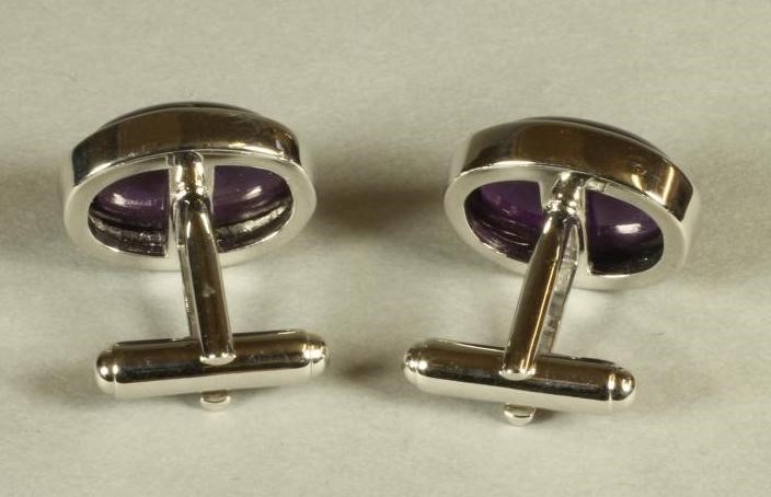 A PAIR OF SILVER CUFFLINKS Image