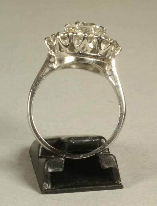 A DIAMOND CLUSTER RING Image