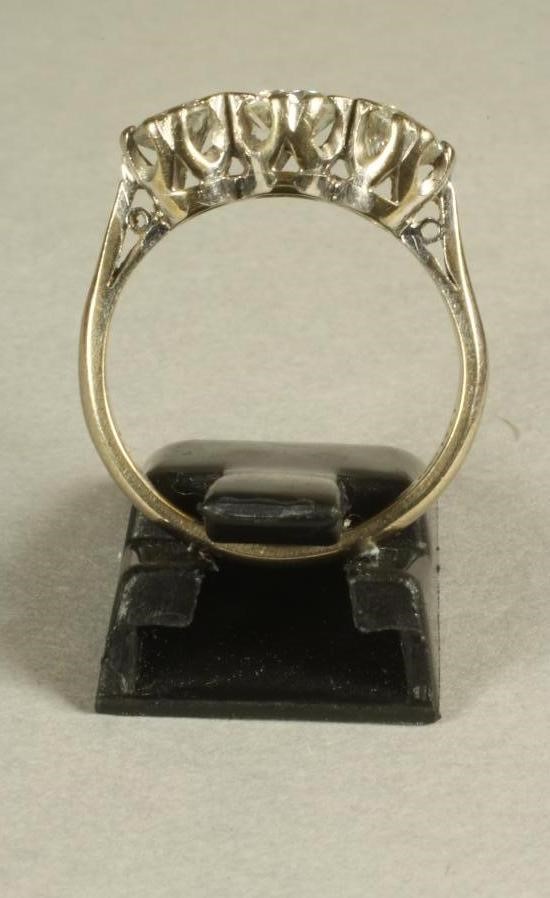 A THREE STONE DIAMOND RING Image
