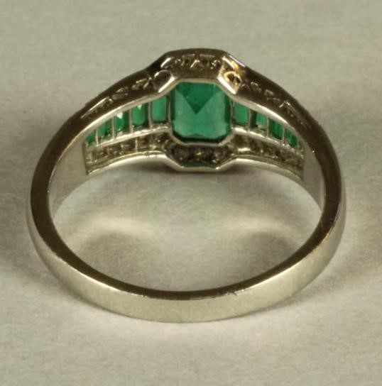AN EMERALD AND DIAMOND DRESS RING Image
