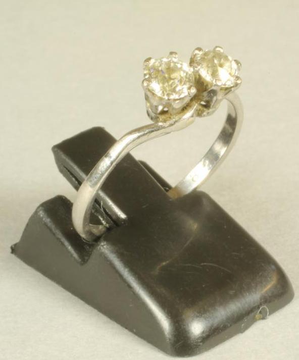 A TWO STONE DIAMOND CROSSOVER RING Image