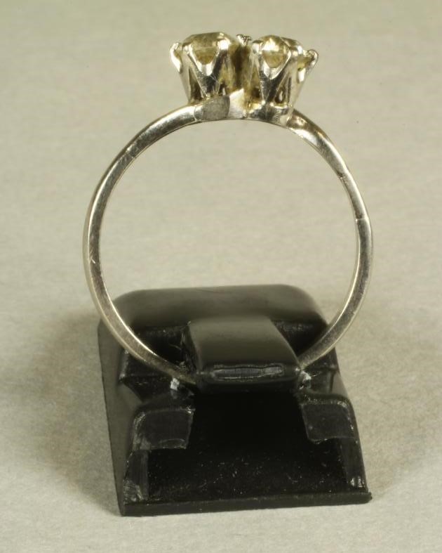 A TWO STONE DIAMOND CROSSOVER RING Image