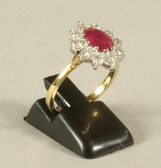 A RUBY AND DIAMOND CLUSTER RING Image