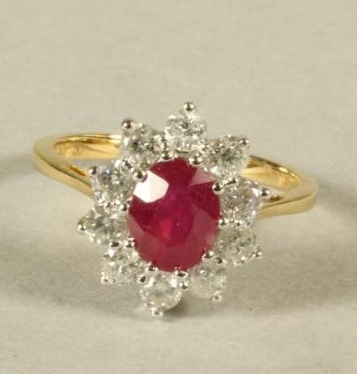 A RUBY AND DIAMOND CLUSTER RING Image