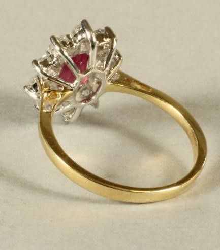 A RUBY AND DIAMOND CLUSTER RING Image