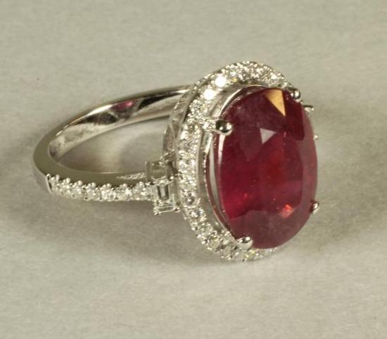 A RUBY AND DIAMOND CLUSTER RING Image