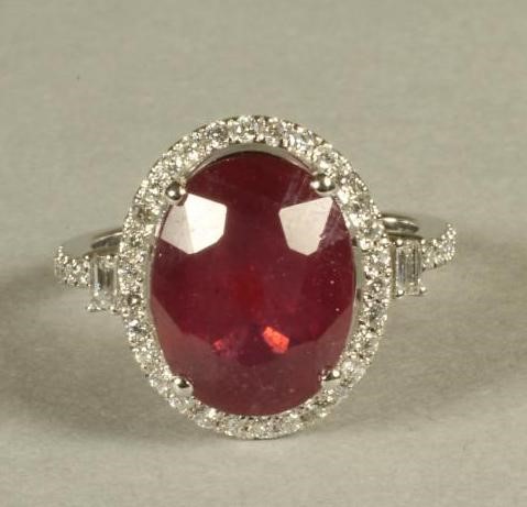 A RUBY AND DIAMOND CLUSTER RING Image
