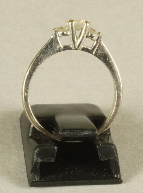 A THREE STONE DIAMOND RING Image