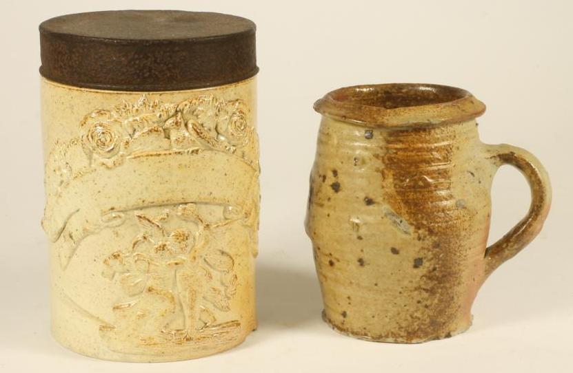 A STONEWARE MUG Image