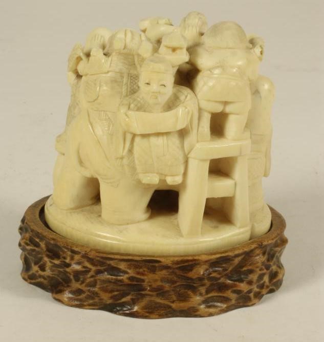 A JAPANESE ONE PIECE IVORY FIGURE GROUP Image