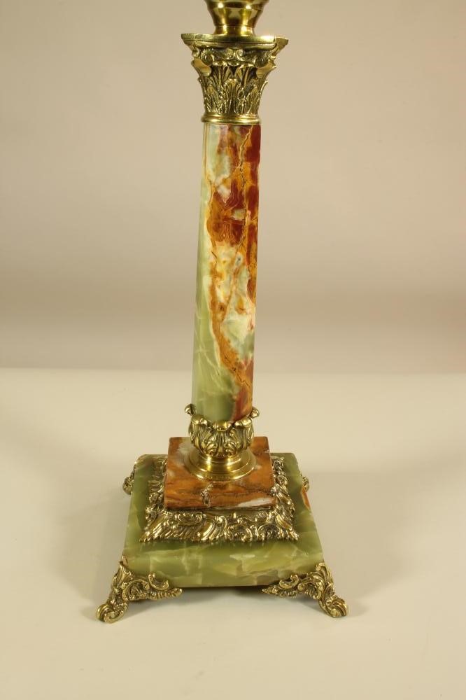 A BRASS MOUNTED ONYX OIL LAMP BASE Image