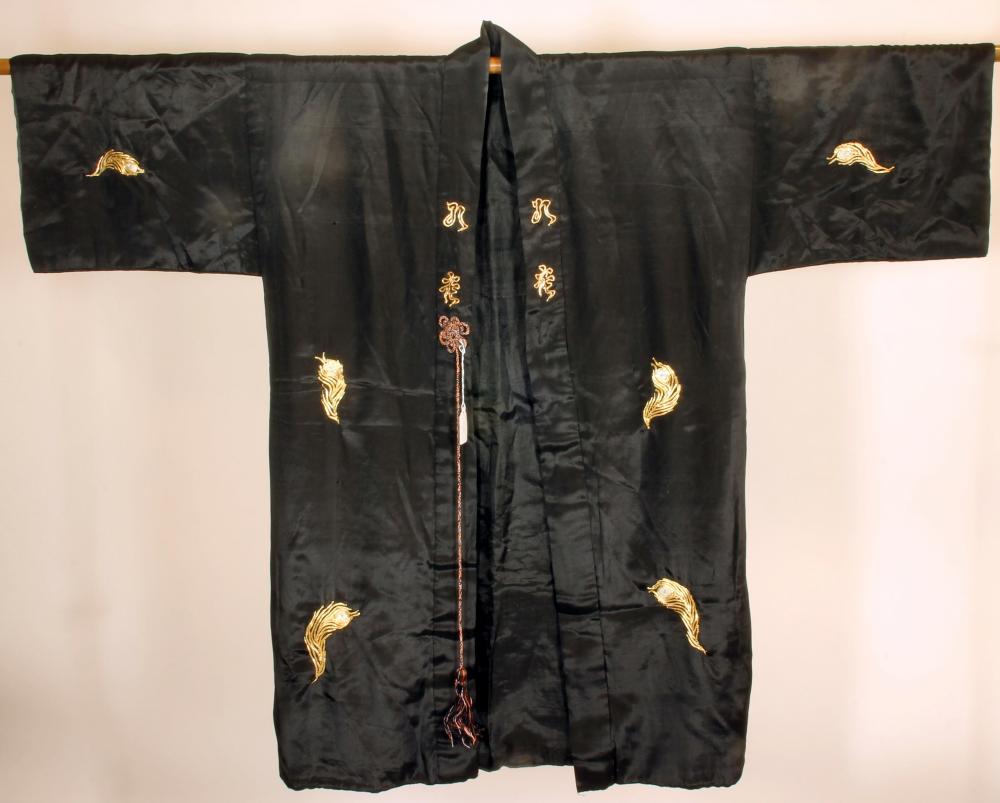 A JAPANESE BLACK SILK KIMONO Image