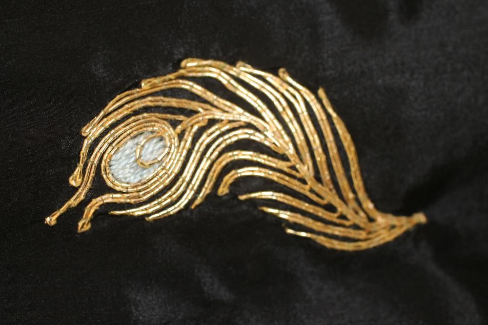 A JAPANESE BLACK SILK KIMONO Image