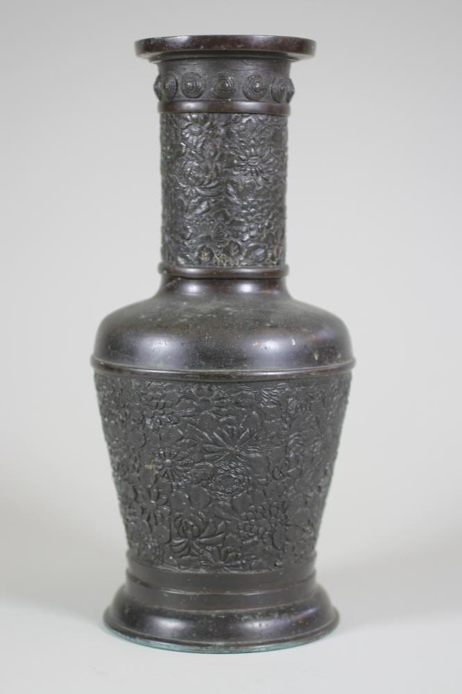 A CHINESE BRONZE VASE of flared cylindrical form with sloping shoulders and tall neck case in low Image