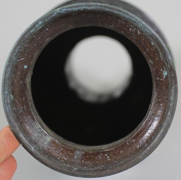 A CHINESE BRONZE VASE of flared cylindrical form with sloping shoulders and tall neck case in low Image