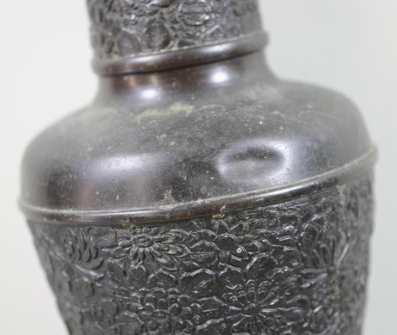 A CHINESE BRONZE VASE of flared cylindrical form with sloping shoulders and tall neck case in low Image