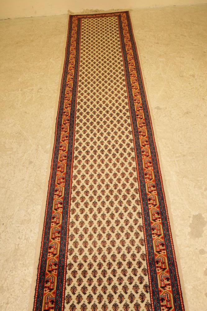 A PERSIAN WOOL RUNNER Image