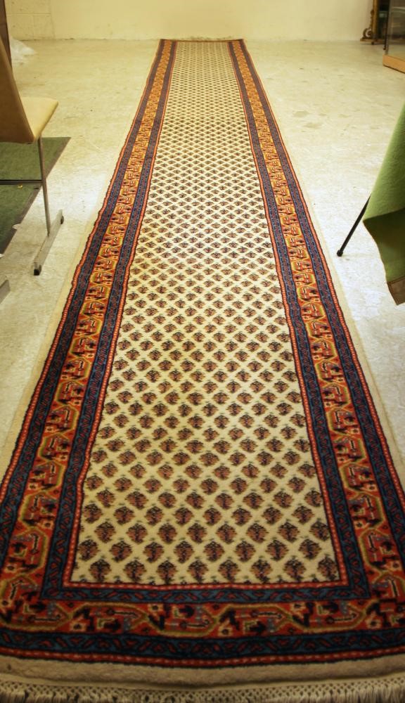 A PERSIAN WOOL RUNNER Image