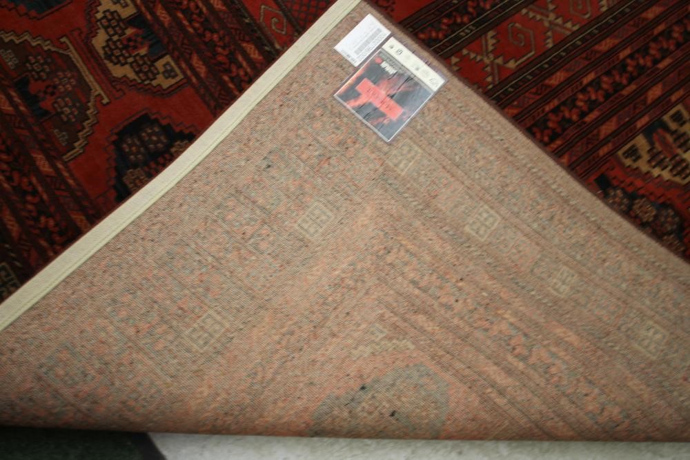 AN AFGHAN STYLE CARPET Image