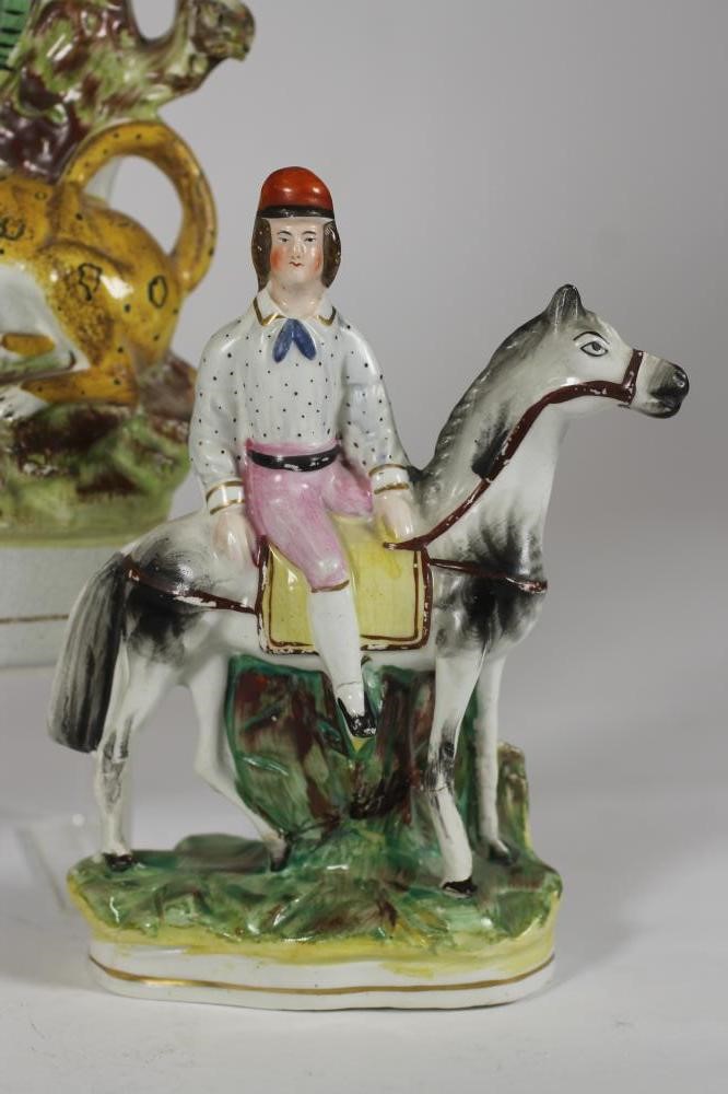 A STAFFORDSHIRE FLATBACK SPILL VASE Image