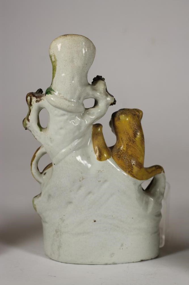 A STAFFORDSHIRE FLATBACK SPILL VASE Image