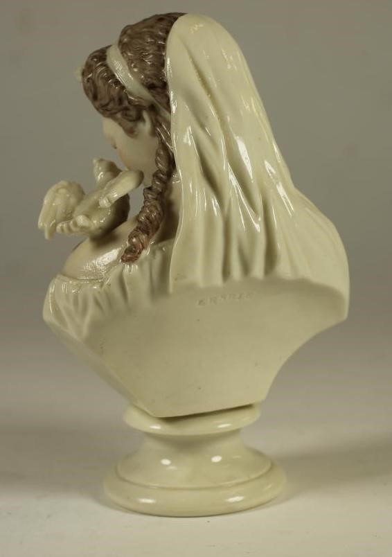 A VICTORIAN TINTED AND GLAZED PARIAN BUST Image