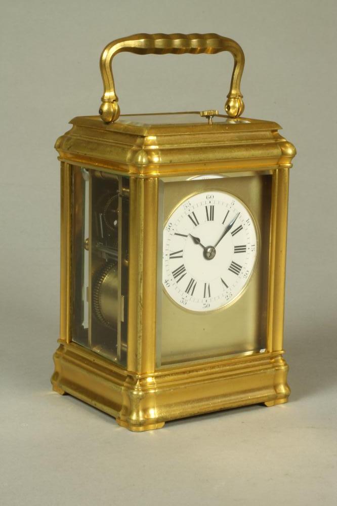 A SMALL CARRIAGE CLOCK Image
