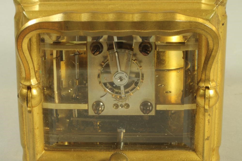 A SMALL CARRIAGE CLOCK Image